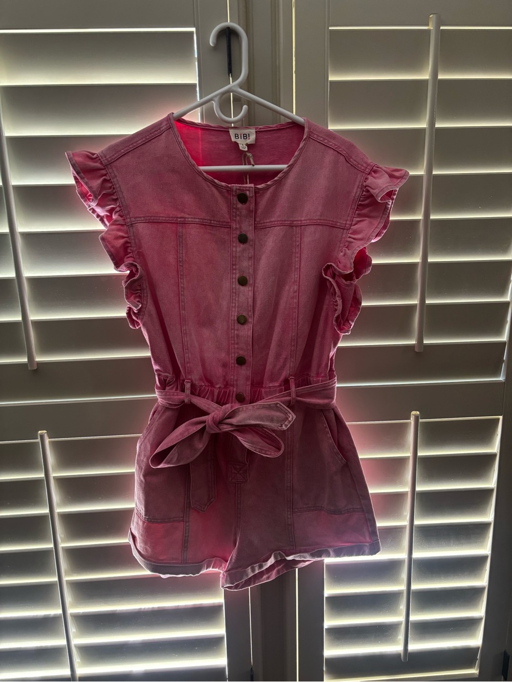 BiBi Pink Ruffle-Sleeve Denim Romper with Self-Tie Belt